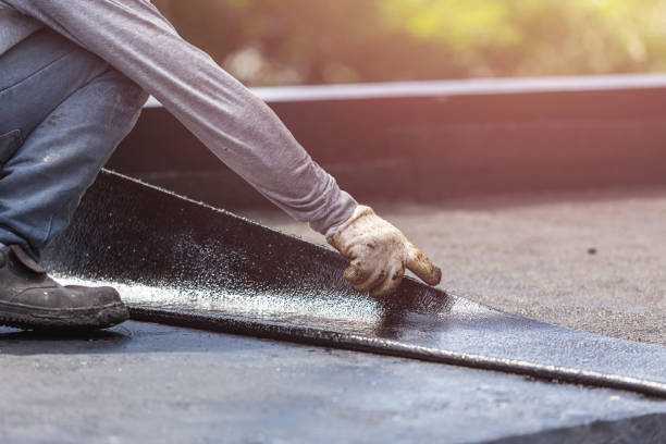 Professional Basement Waterproofing technician working in Boswell, IN